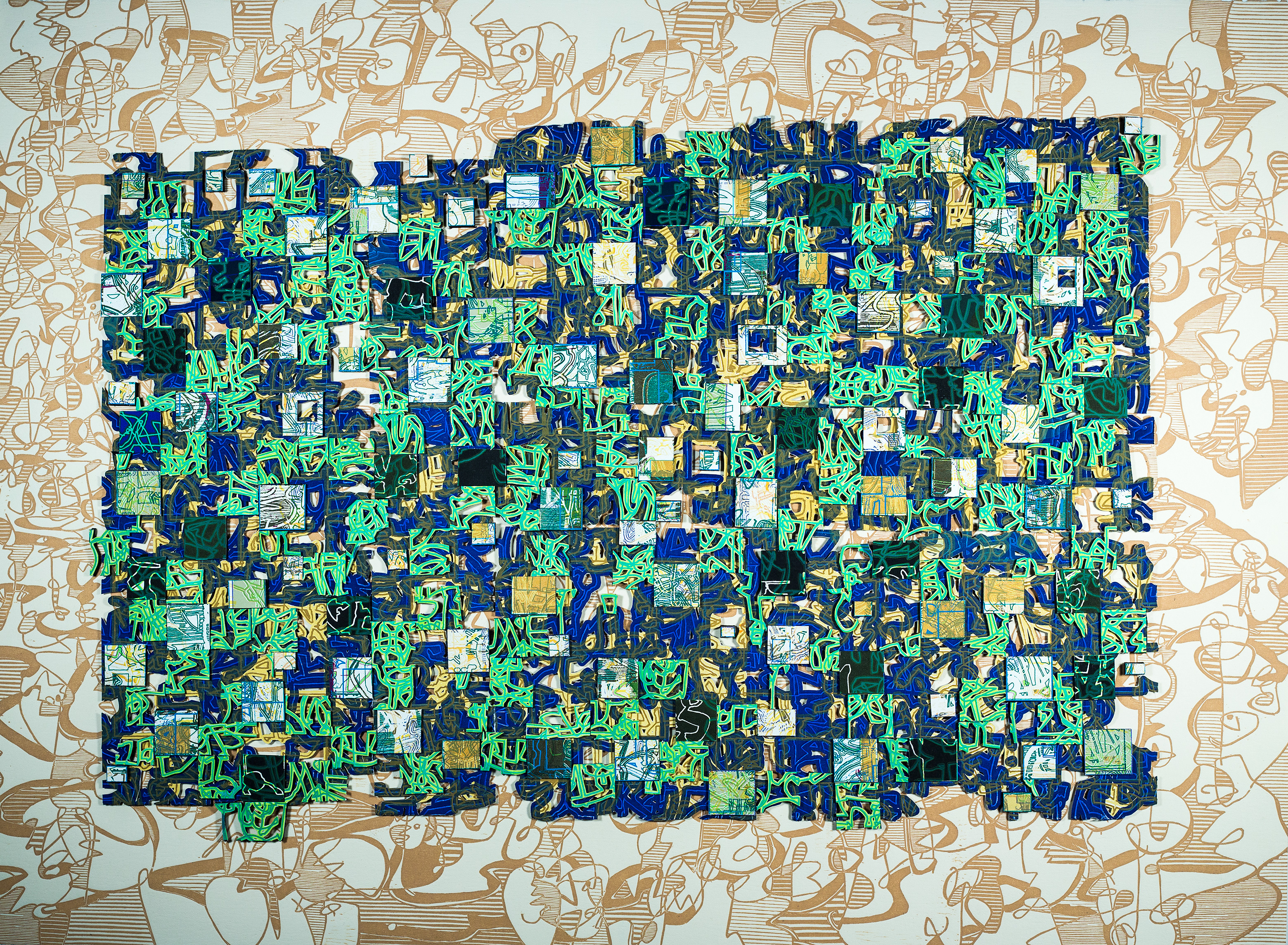 A large painting of green and blue squares on a white background.