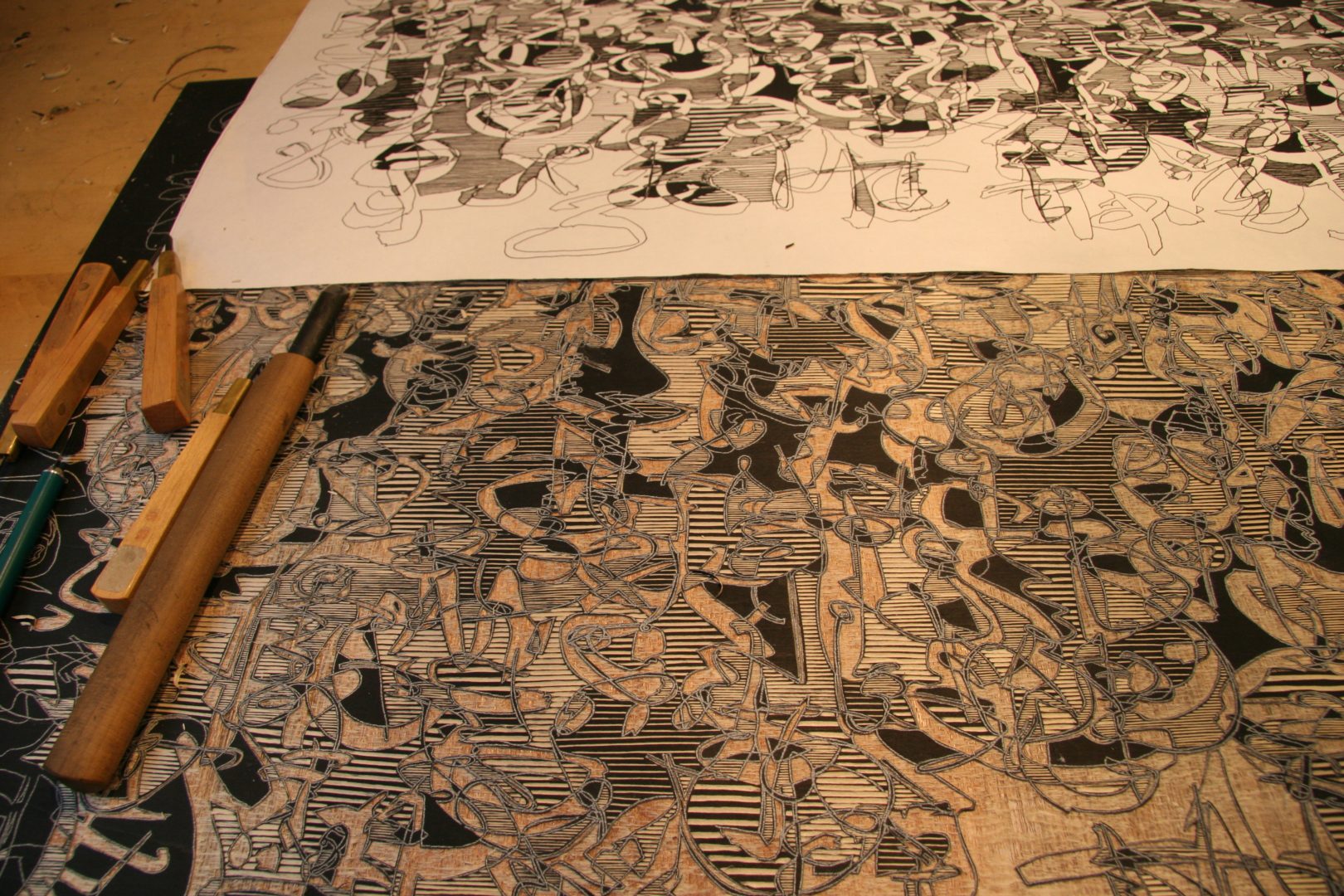 A close up of two papers with drawings on them